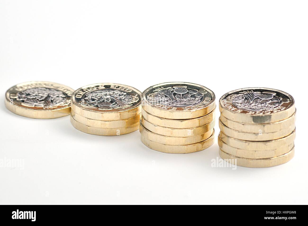 Stapel von neuen Pfund-Münzen Stockfoto