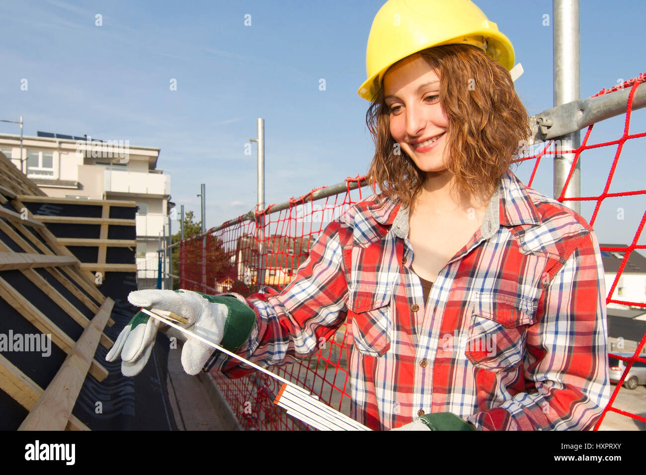 Frau als Bauarbeiter, Frau als Bauarbeiterin Stockfoto