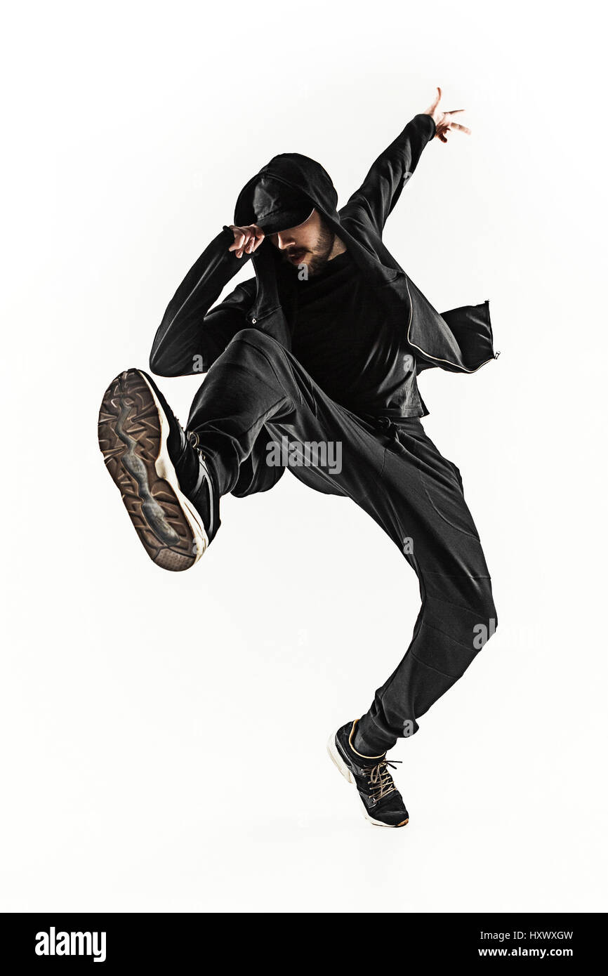 Die Silhouette von einem Hip-Hop-männliche Pause Tänzer tanzen auf weißem Hintergrund Stockfoto