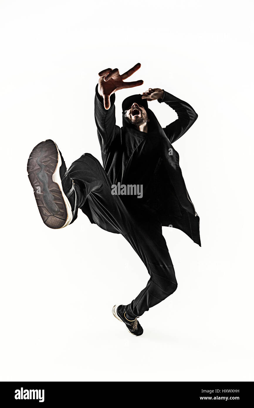Die Silhouette von einem Hip-Hop-männliche Pause Tänzer tanzen auf weißem Hintergrund Stockfoto
