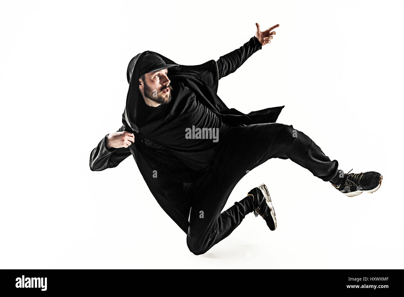 Die Silhouette von einem Hip-Hop-männliche Pause Tänzer tanzen auf weißem Hintergrund Stockfoto