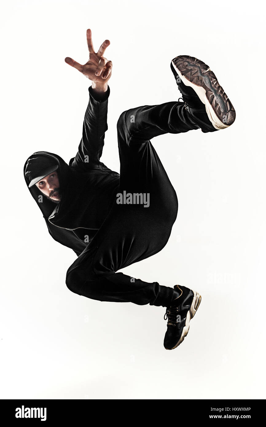 Die Silhouette von einem Hip-Hop-männliche Pause Tänzer tanzen auf weißem Hintergrund Stockfoto