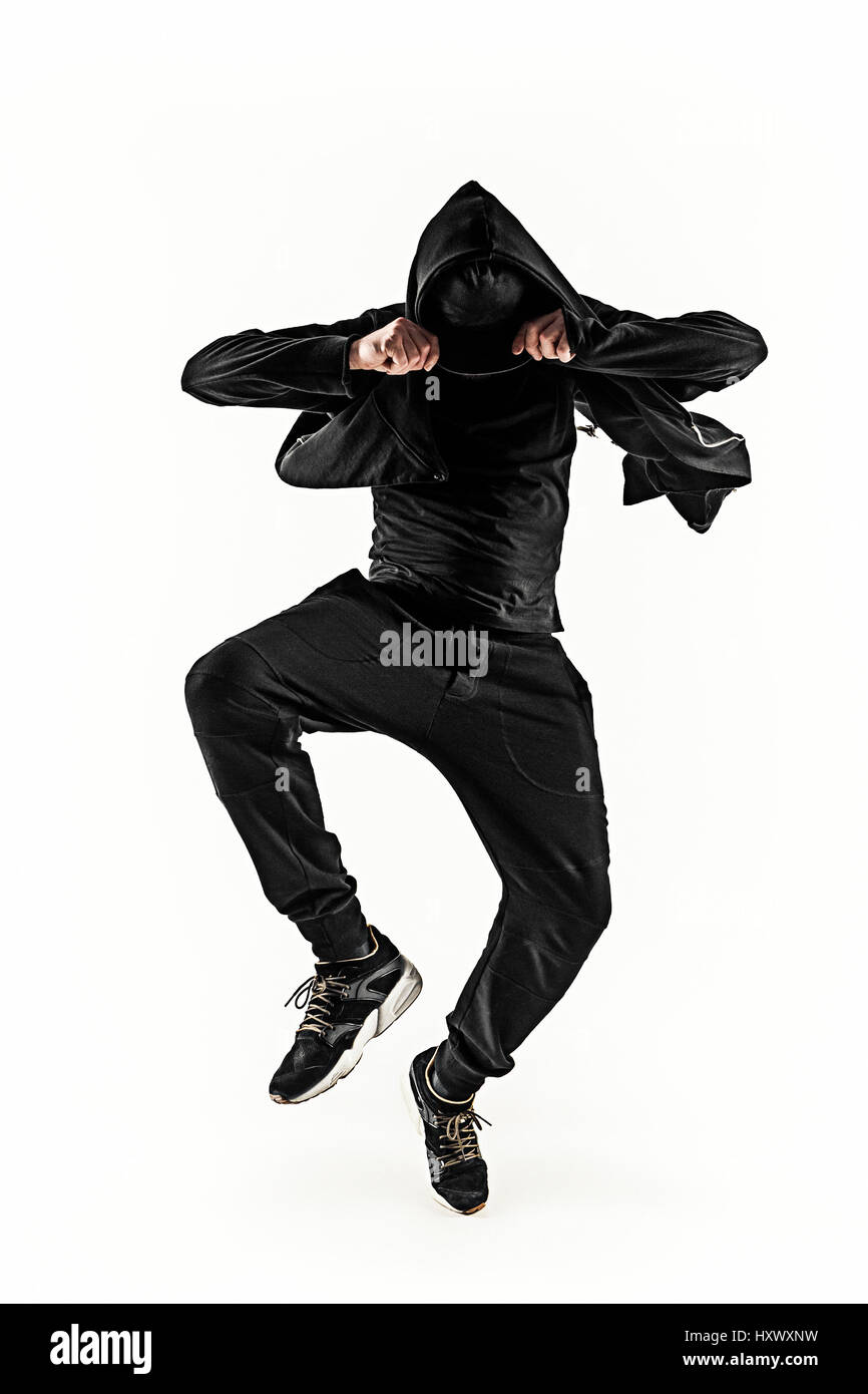 Die Silhouette von einem Hip-Hop-männliche Pause Tänzer tanzen auf weißem Hintergrund Stockfoto