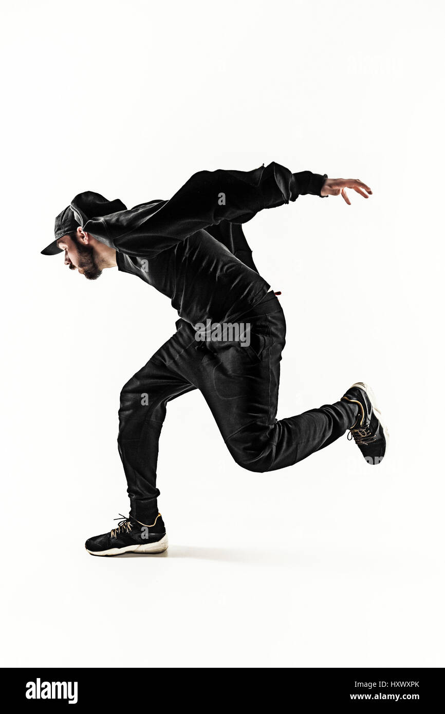 Die Silhouette von einem Hip-Hop-männliche Pause Tänzer tanzen auf weißem Hintergrund Stockfoto