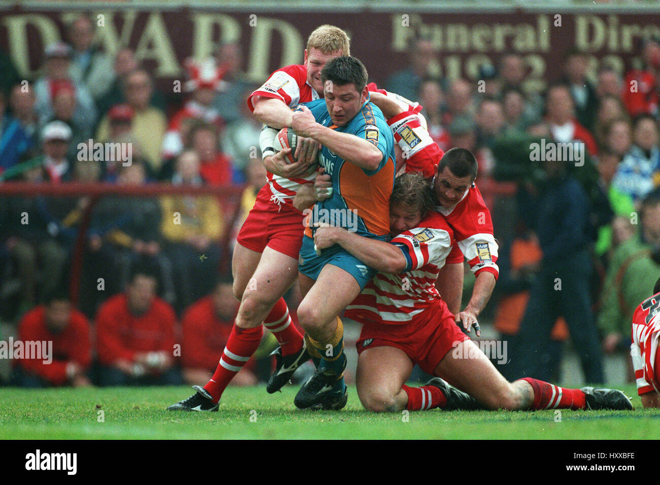 O' NEIL COWIE HOUGHTON & REBER WIGAN WARRIORS V ST. HELENS 7. April 1999 Stockfoto