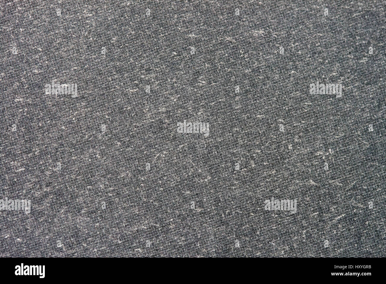Textur des organischen dunkel graues Papier für Artwork mit zahlreichen natürlichen Einschlüssen. Modernen dunklen Hintergrund, Hintergrund, Substrat, Zusammensetzung Verwendung mit Textfreiraum Stockfoto