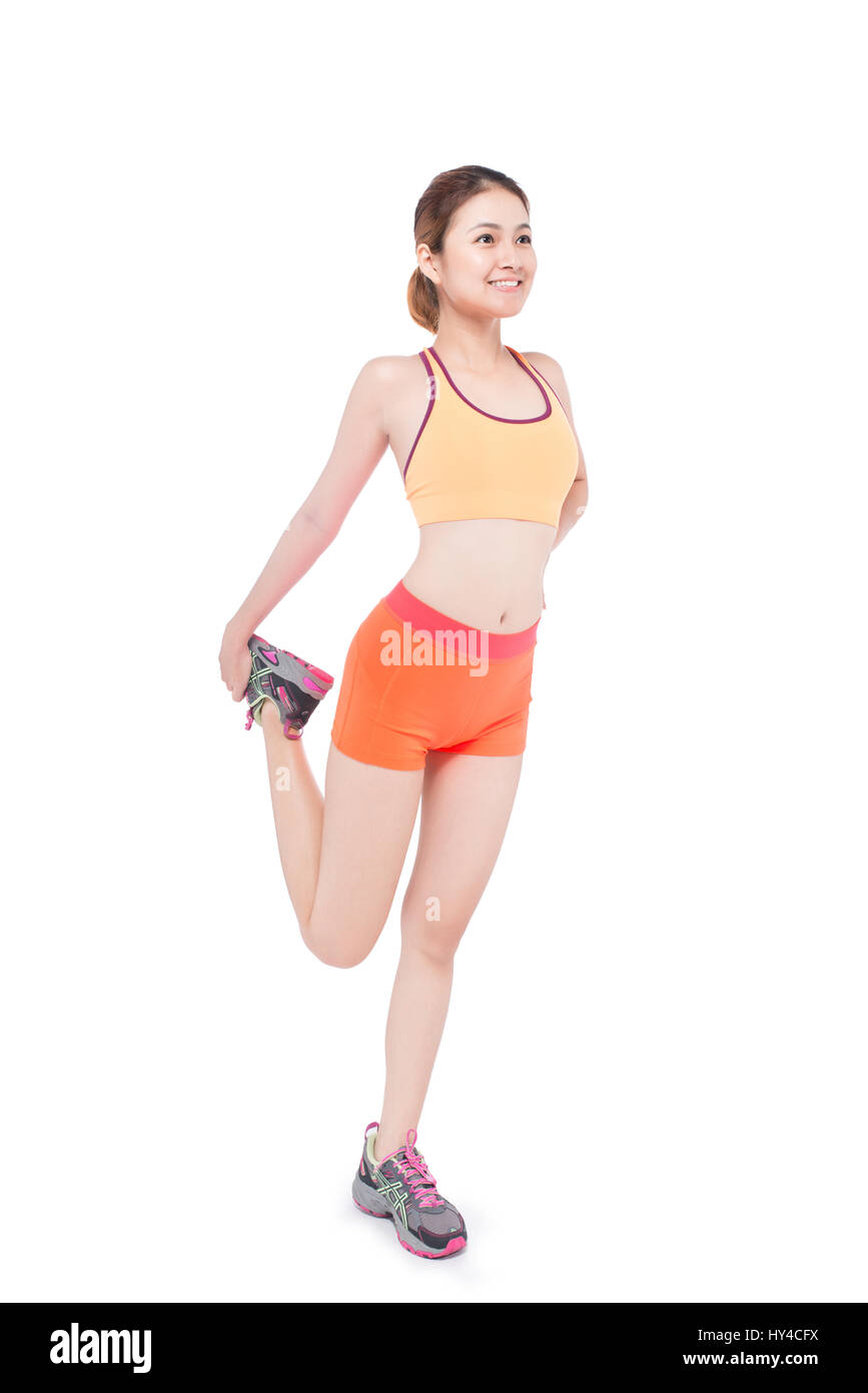 schöne sportliche Frau Übung isoliert auf weißem Hintergrund in voller Länge Stockfoto