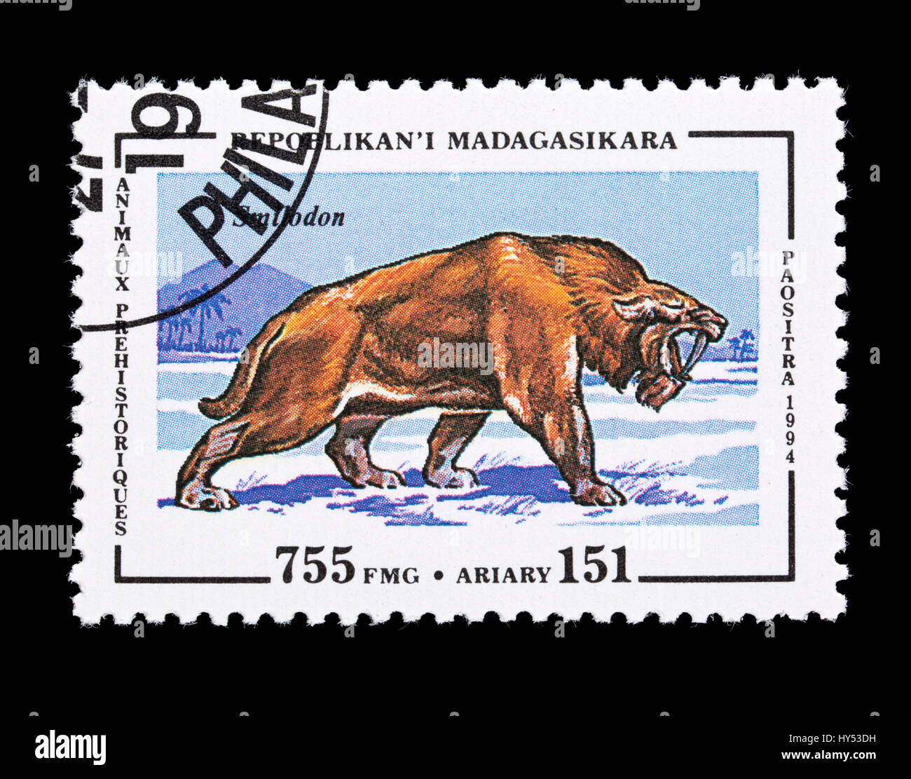 Briefmarke aus Madagaskar Darstellung ein smilodon Stockfoto