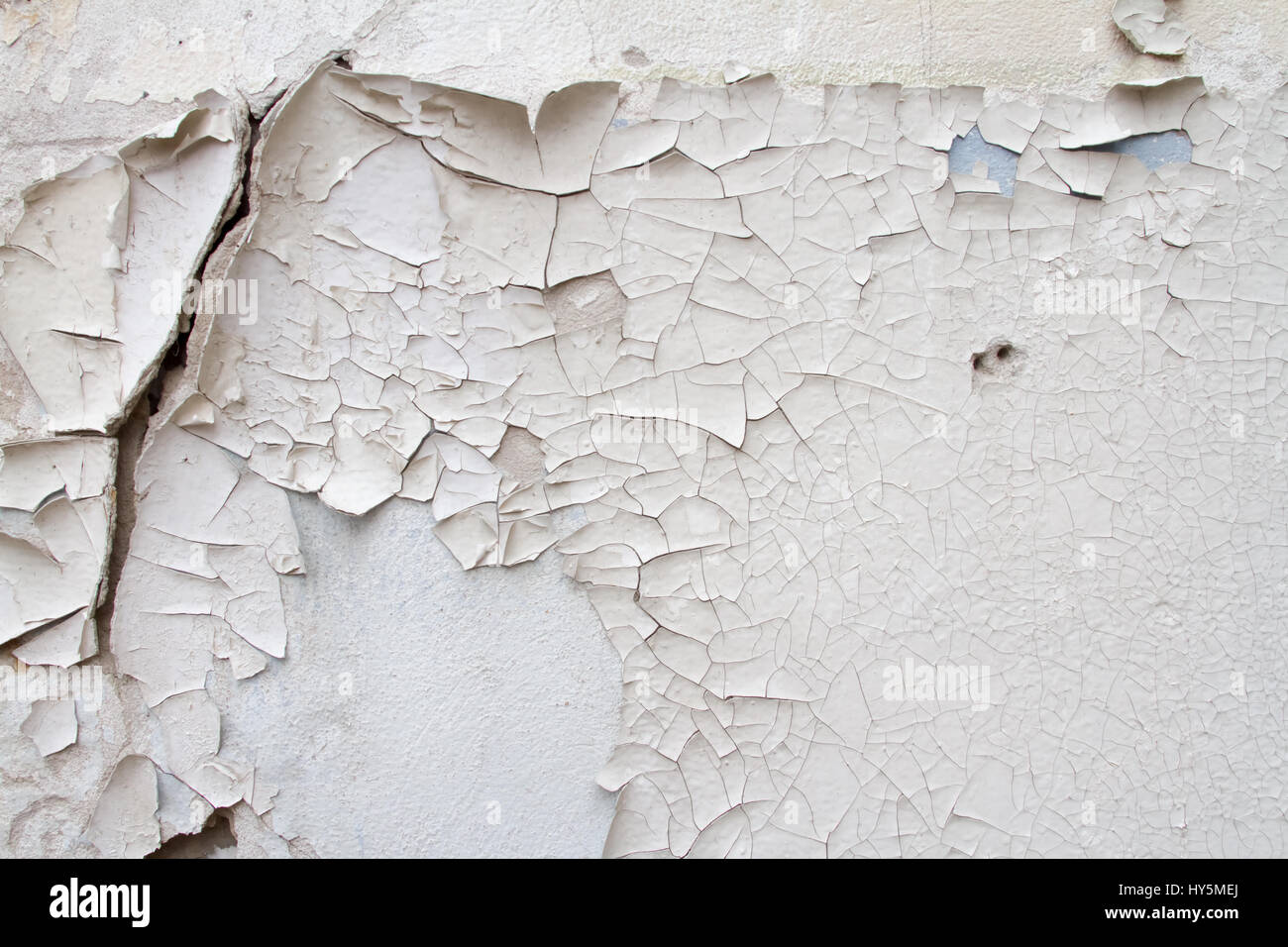 Vintage Hintergrundtextur von alten Ziegel Mauerwerk auf alten Zement mit Rissen mit Spuren von alten Farbe. Stockfoto