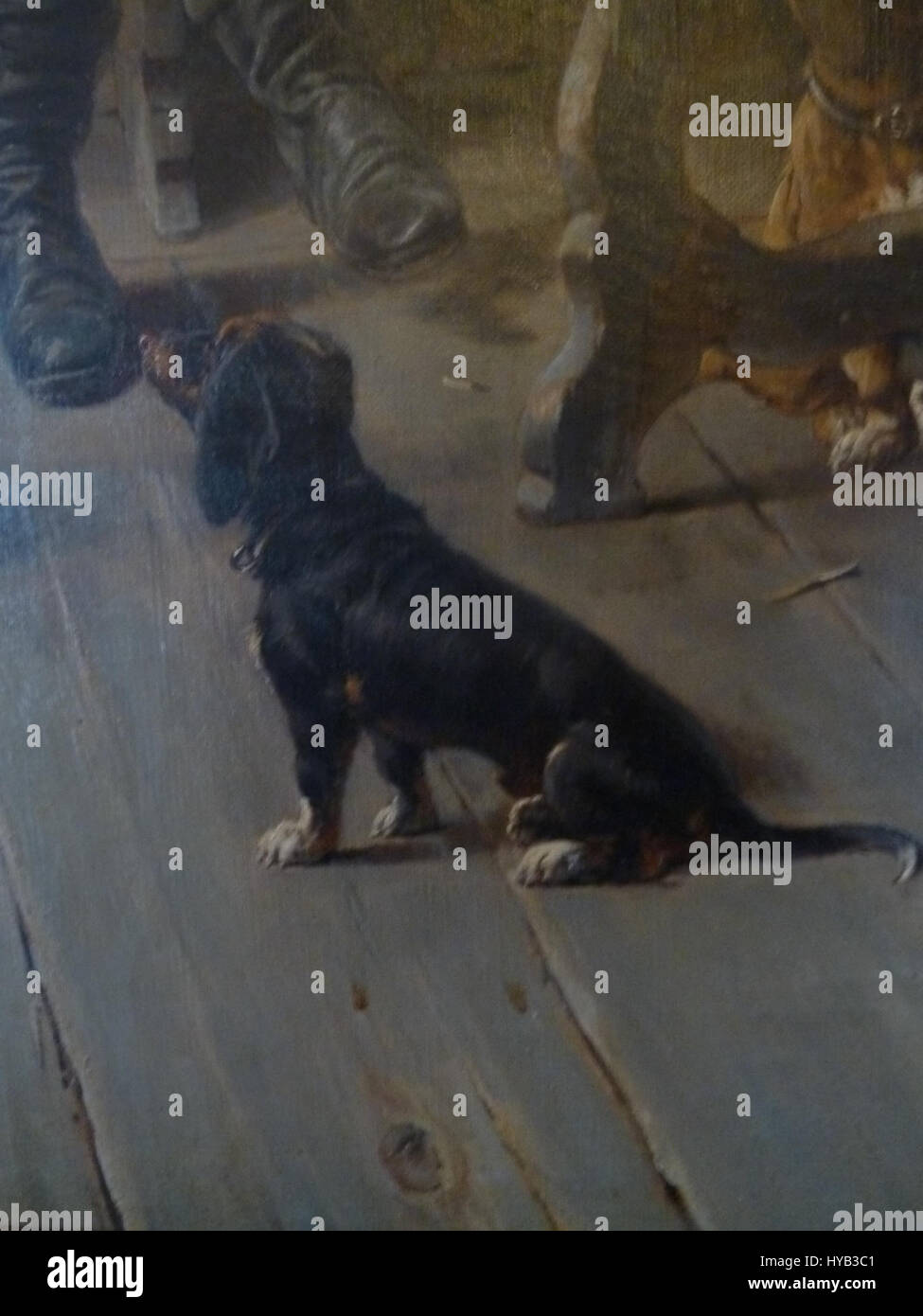 Dieses detailreiche Gemälde von Adolf Humborg konzentriert sich auf eine Küchenszene mit einem Dackel, der einen Moment im Wohnstil des 19. Jahrhunderts festhält. Die Liebe zum Detail sowohl im Innenraum als auch im Tier spiegelt Humborgs Fähigkeit wider, das tägliche Leben festzuhalten. Stockfoto