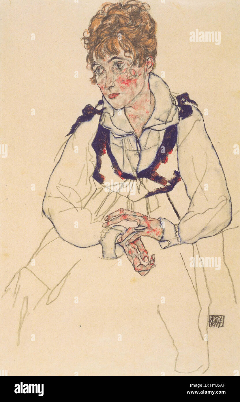 Egon Schieles „Bildnis Edith Schiele“ (1917) ist ein eindrucksvolles Porträt der Frau des Künstlers, das sowohl ihre körperliche Erscheinung als auch ihre emotionale Intensität einfängt. Schieles charakteristisches markantes Linienwerk und die raue Darstellung des Themas zeigen seine einzigartige Herangehensweise an expressionistische Porträtmalerei. Stockfoto Egon Schieles „Bildnis Edith Schiele“ (1917) ist ein eindrucksvolles Porträt der Frau des Künstlers, das sowohl ihre körperliche Erscheinung als auch ihre emotionale Intensität einfängt. Schieles charakteristisches markantes Linienwerk und die raue Darstellung des Themas zeigen seine einzigartige Herangehensweise an expressionistische Porträtmalerei. Stockfoto