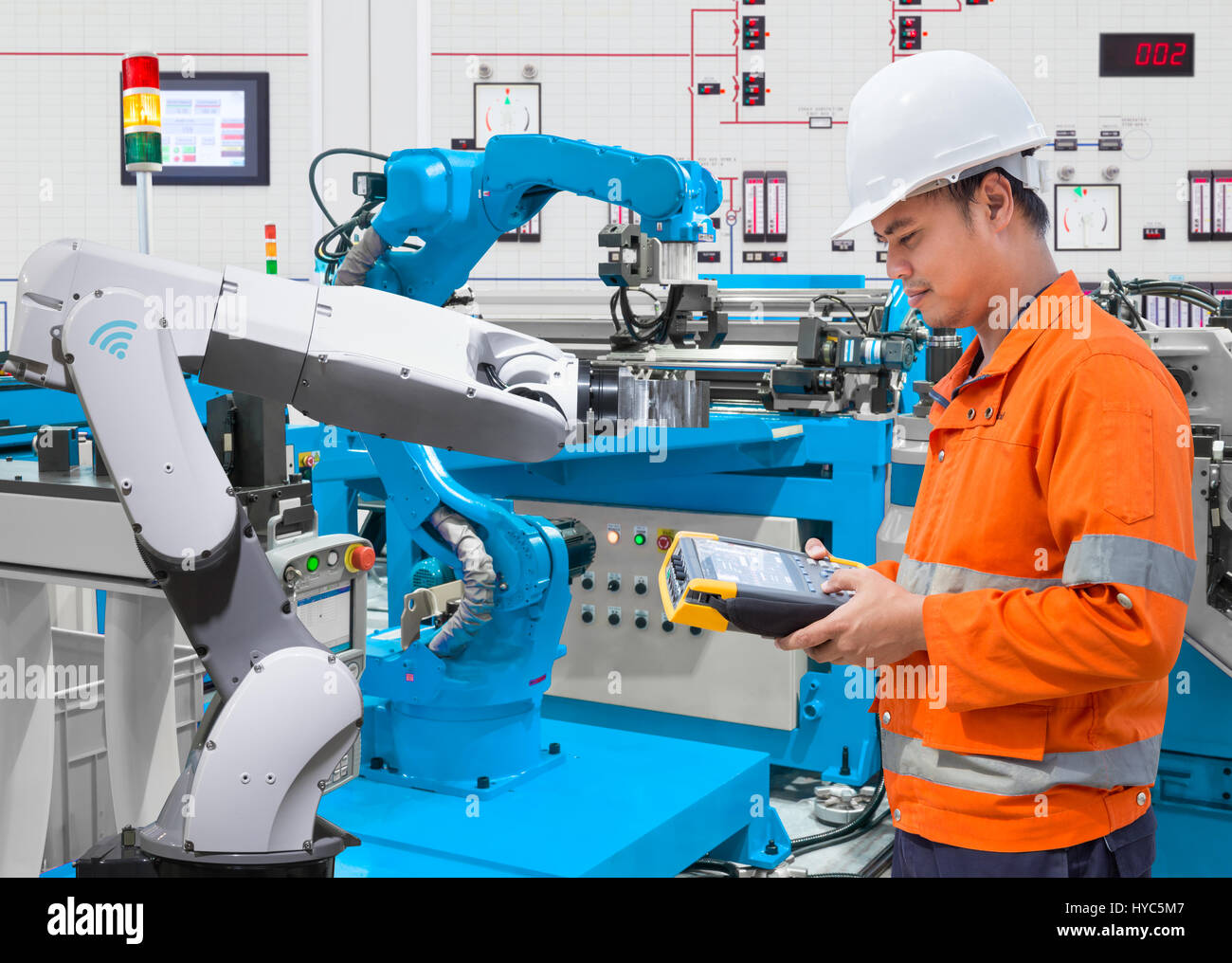 Instandhalter Programmierung automatische Roboter Industrie 4.0-Konzept Stockfoto