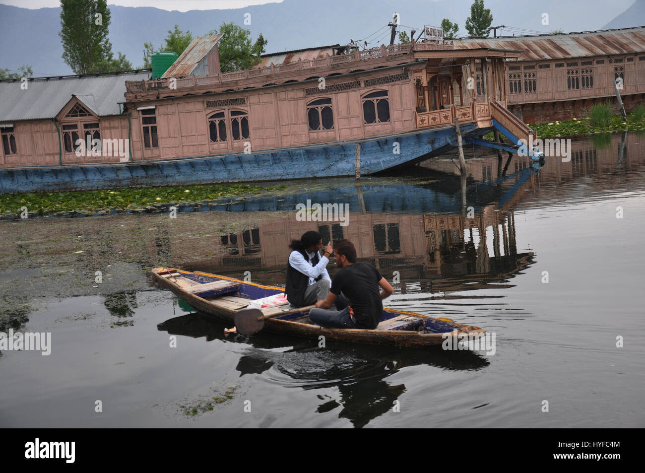 Kashmir Dal See, unbekannte Touristen genießen Boot Dal See (Photo Copyright © by Saji Maramon) Stockfoto