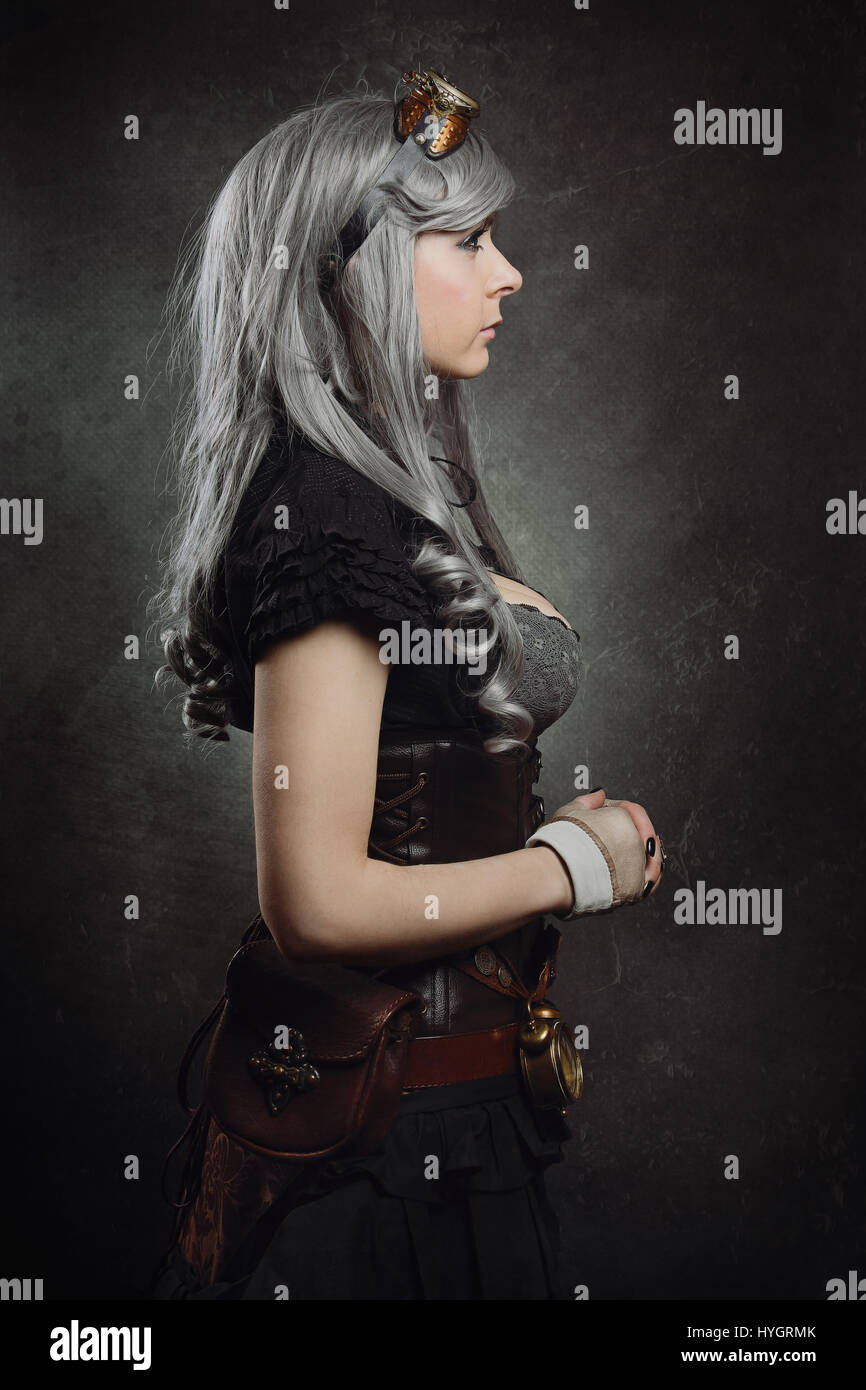 Sideaways Portrait eines Mädchens Steampunk. Textur-Hintergrund Stockfoto