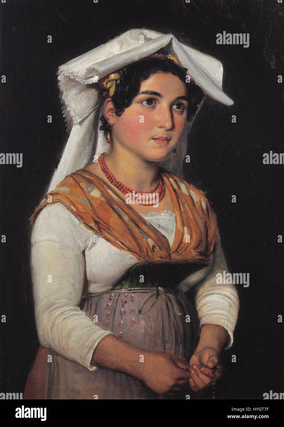 Eine junge, stehende italienische Frau, die einen Rosenkranz hält, gemalt von Wilhelm Marstrand, einem dänischen Künstler, in Italien zwischen 1836 und 1840. Stockfoto