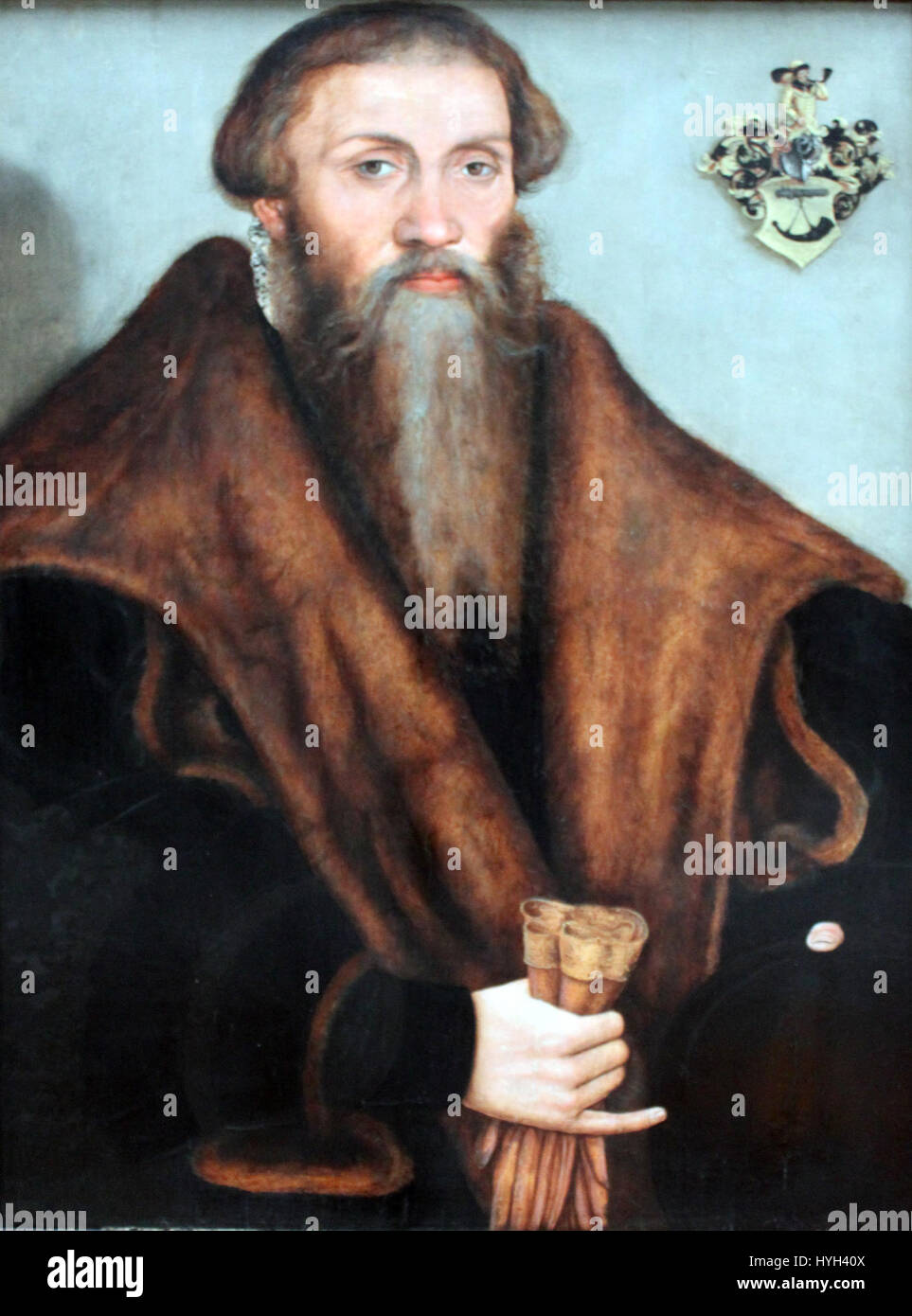 Das Porträt von Leonhard Badehorn von Lucas Cranach dem Jüngeren aus dem Jahr 1570 zeigt einen angesehenen Juristen in Deutschland der Renaissance. Cranachs präziser Stil spiegelt den Status und die intellektuelle Natur des Rechtsgelehrten wider. Stockfoto