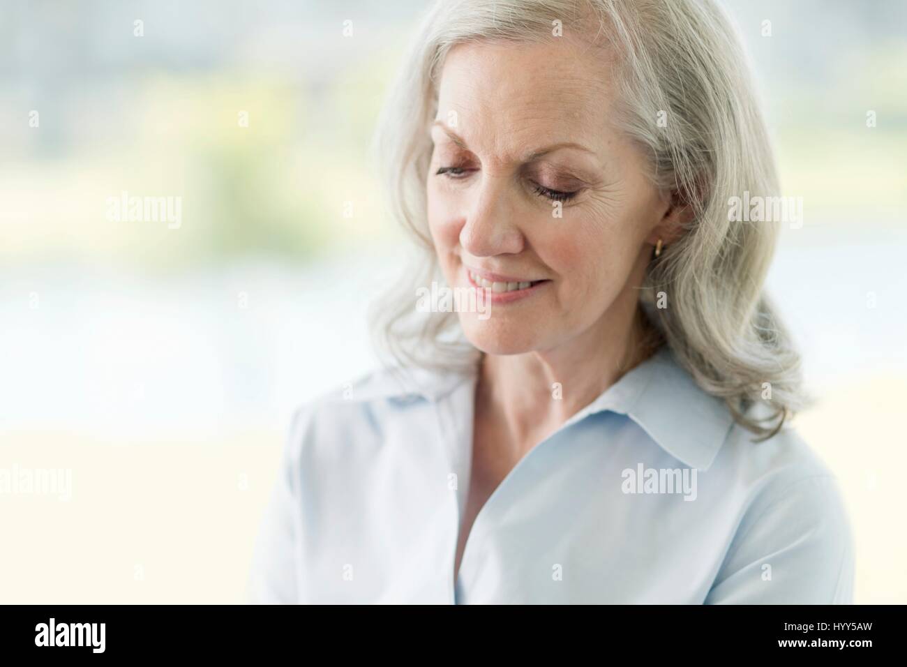 Ältere Frau, Lächeln, Porträt. Stockfoto