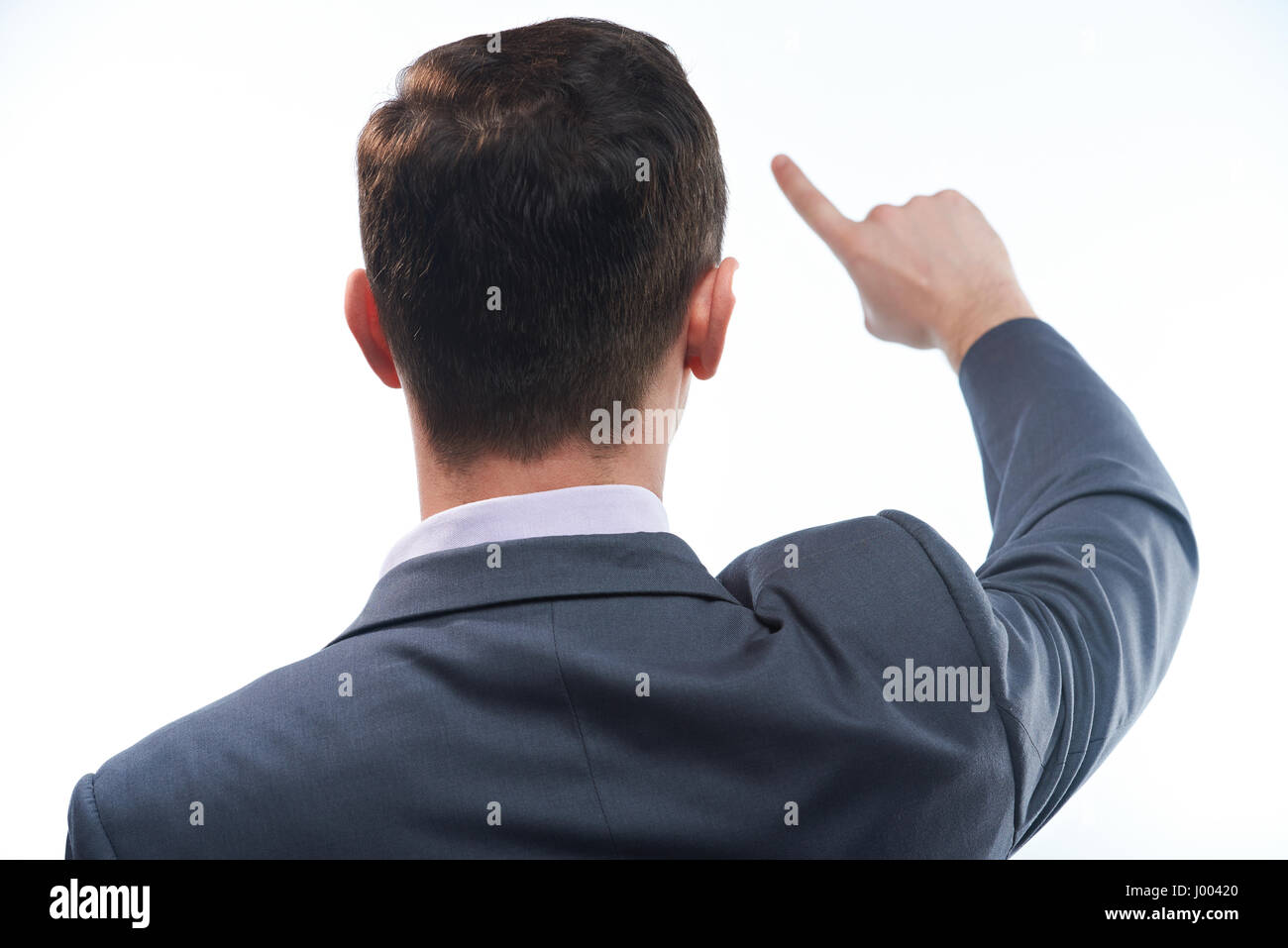 Rückseite des Mann berühren Raum mit Finger isoliert auf weißem Hintergrund Stockfoto