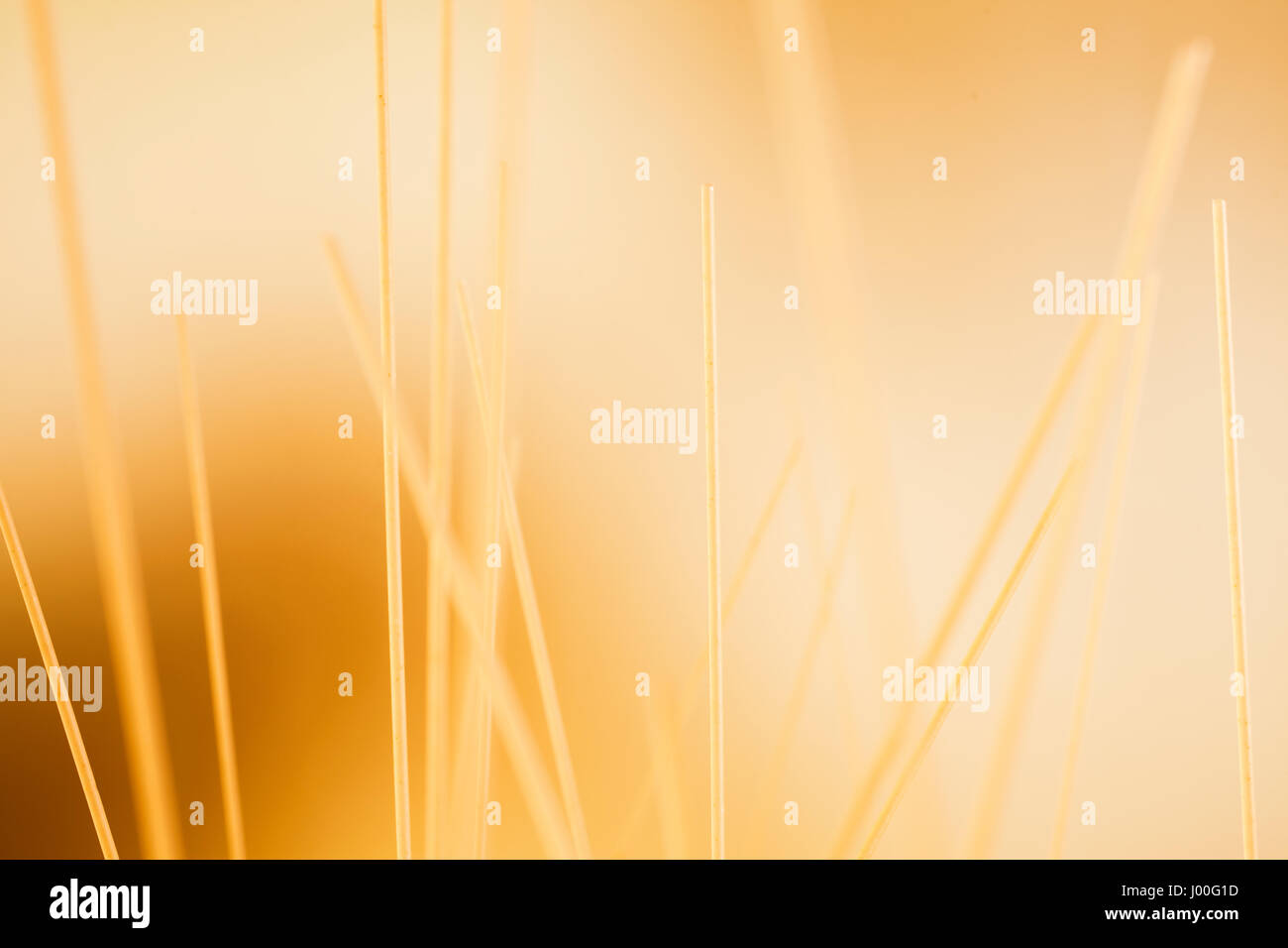 Hintergrund Makro Zusammensetzung ungekocht getrocknete Spaghetti Stockfoto
