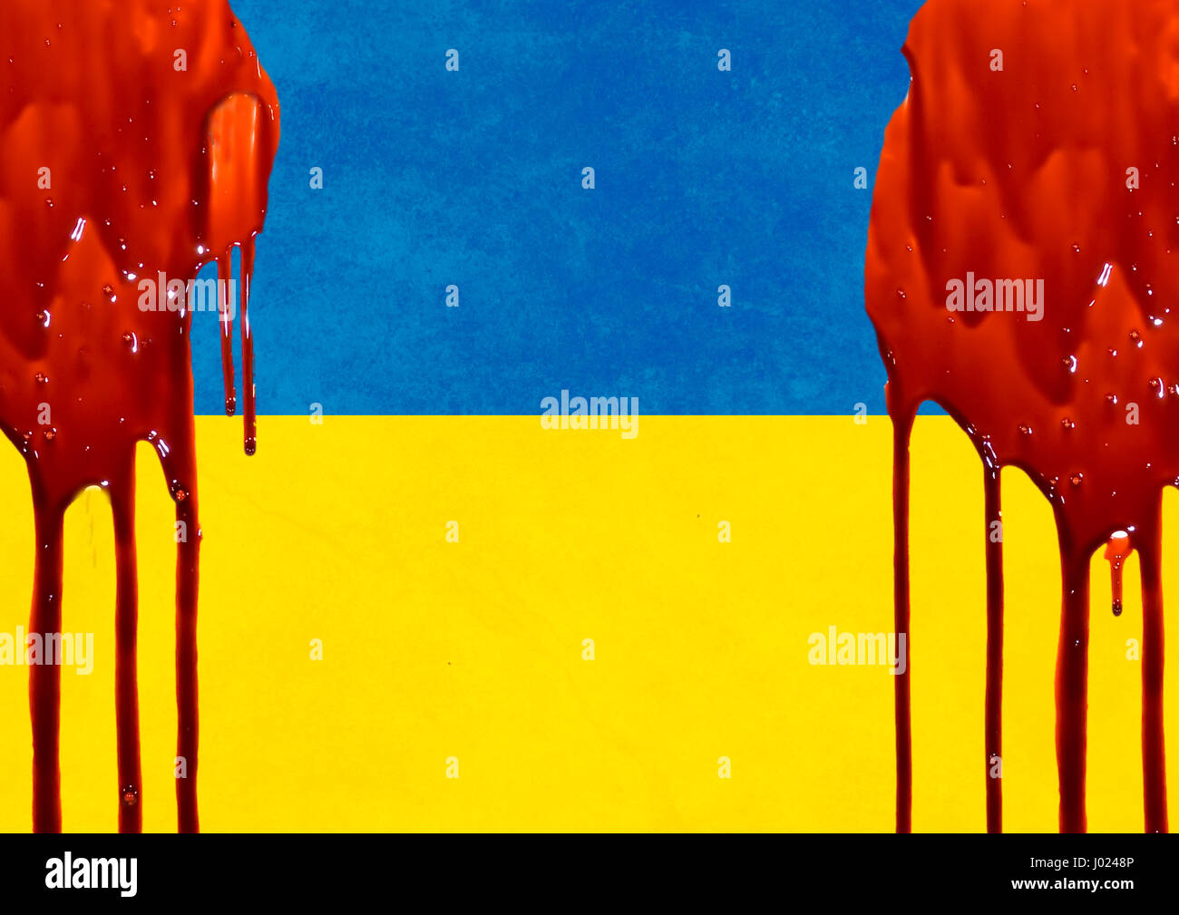 Ukrainische Flagge im Blut. Revolution in der Ukraine Stockfoto