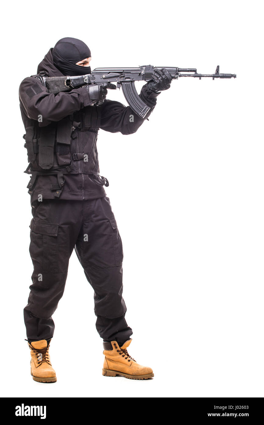 Terrorist mit Waffe auf weißem Hintergrund Stockfoto