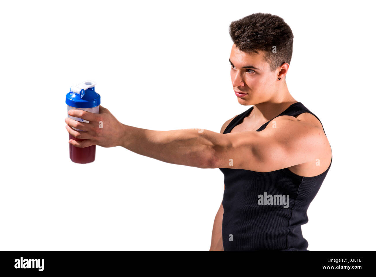Muskulösen jungen männlichen Bodybuilder halten shaker Stockfoto