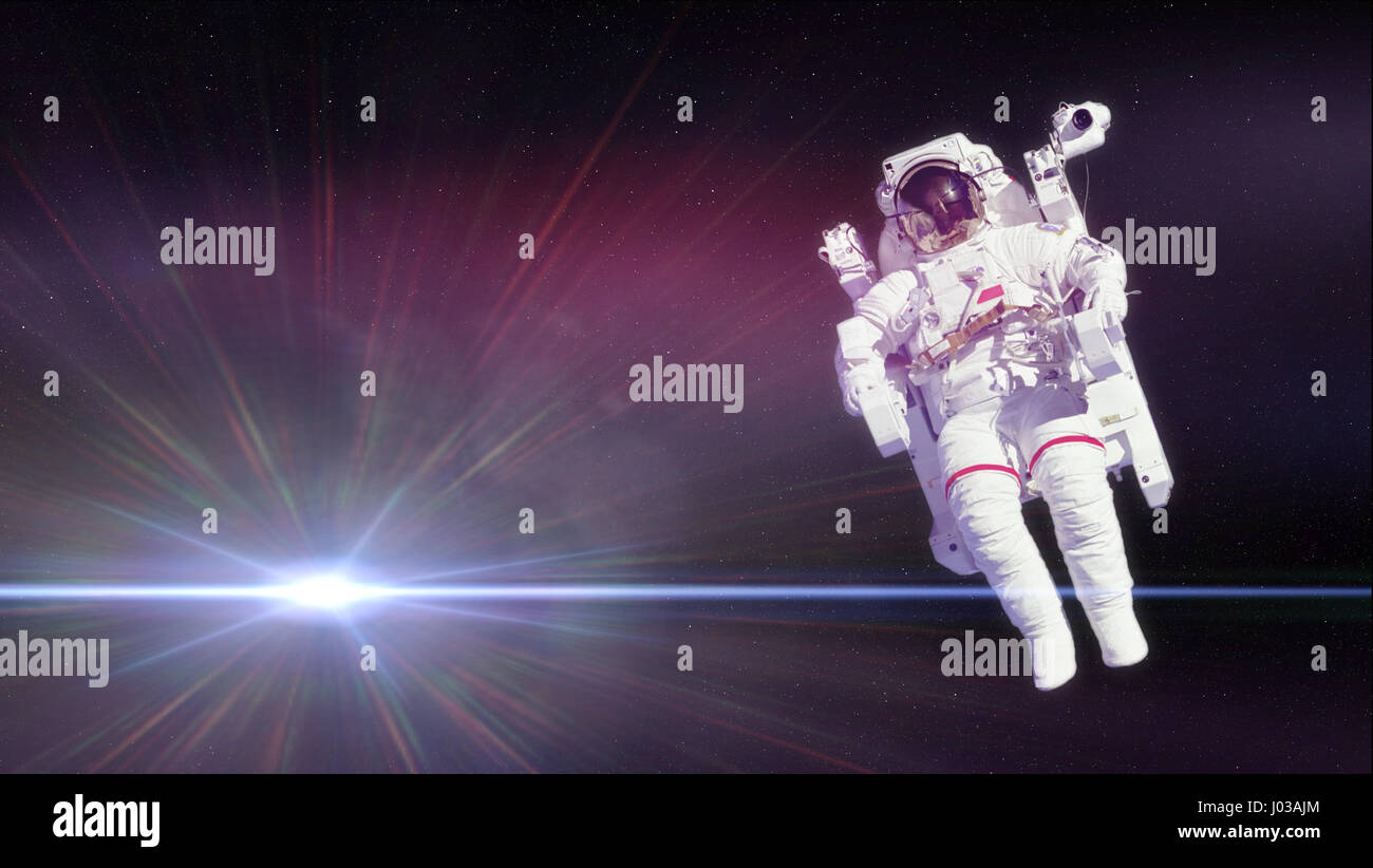 Astronaut in einem EMU (Extravehicular Mobility Unit) vor einem hellen Stern im Deep Space (Elemente des Bildes sind von der NASA eingerichtet) 002 Stockfoto
