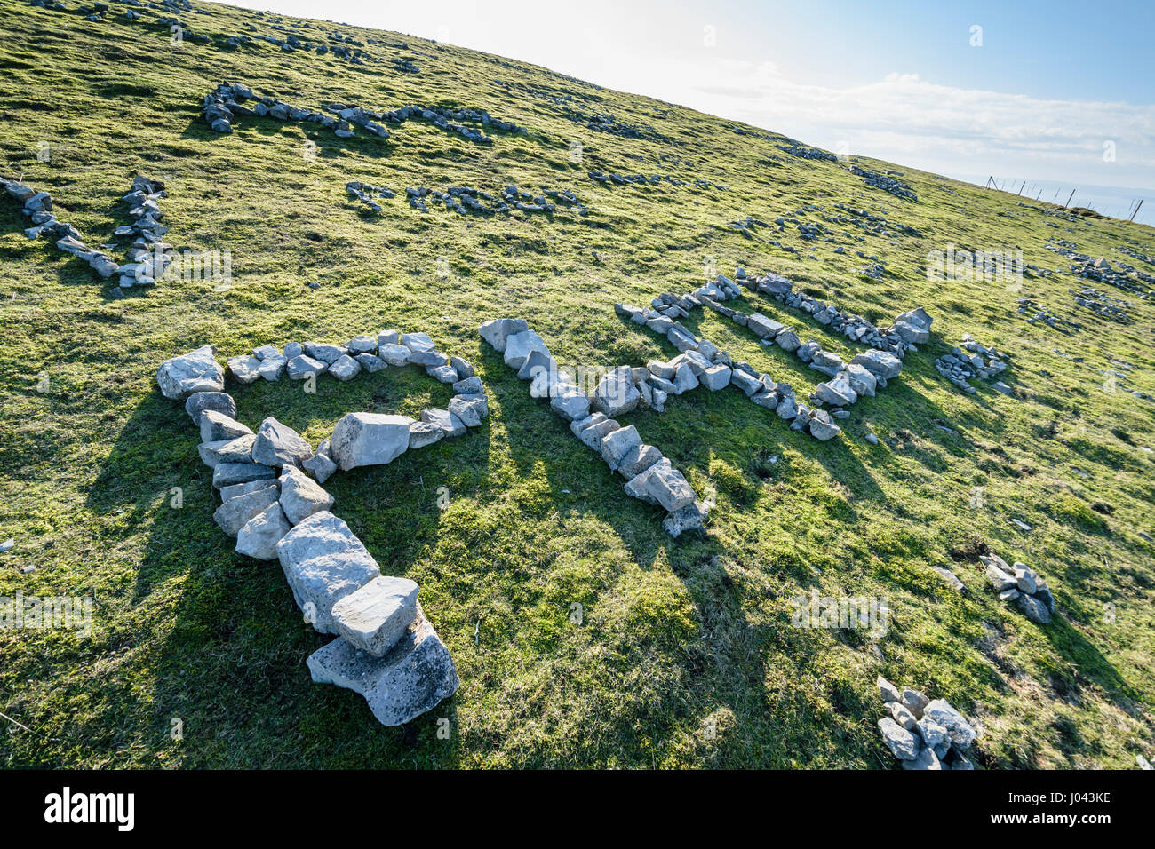 Den Namen Phil in Stein Nachricht auf Great Ormes Kopf in Llandudno North Wales UK Stockfoto
