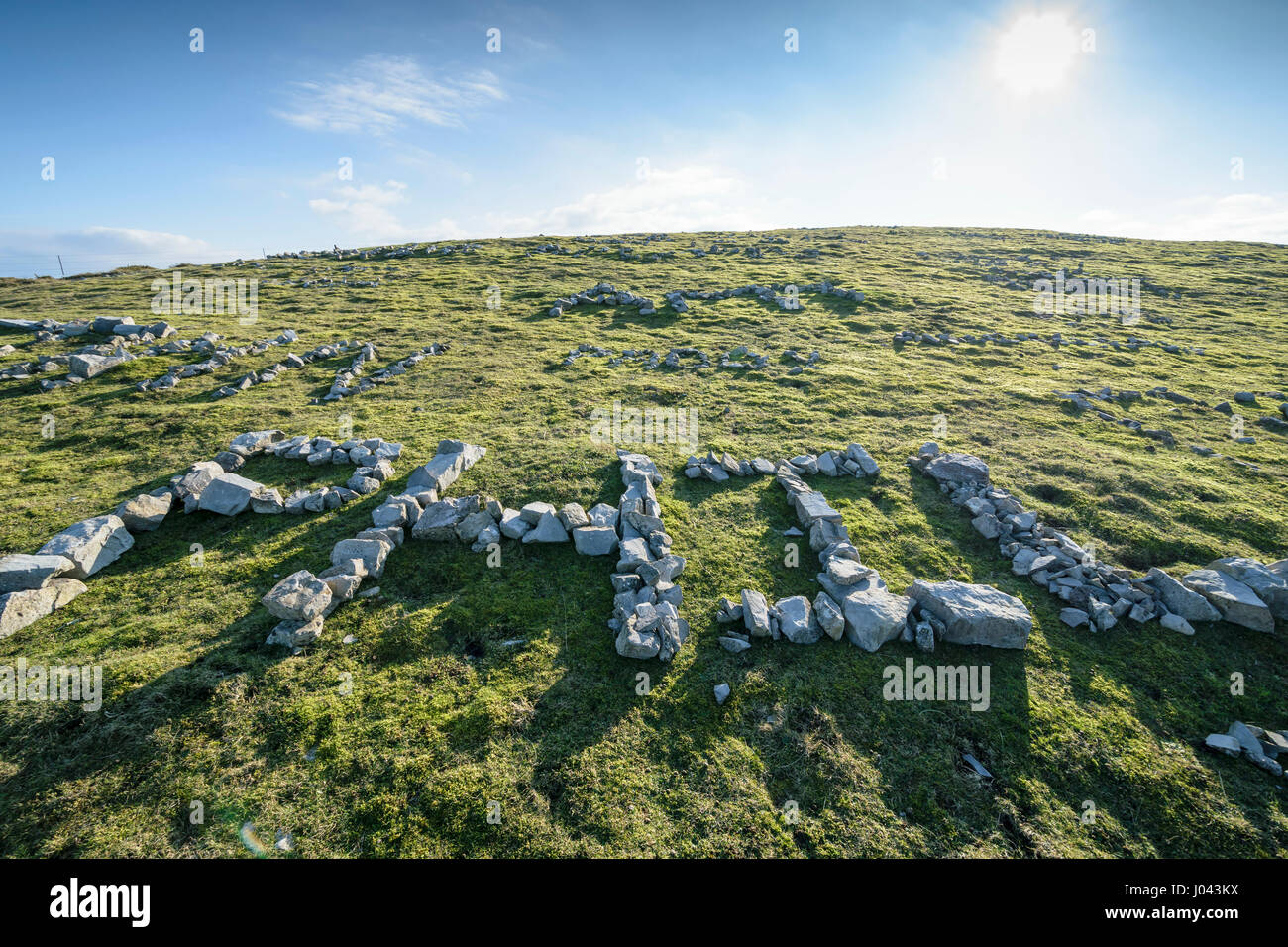 Den Namen Phil in Stein Nachricht auf Great Ormes Kopf in Llandudno North Wales UK Stockfoto