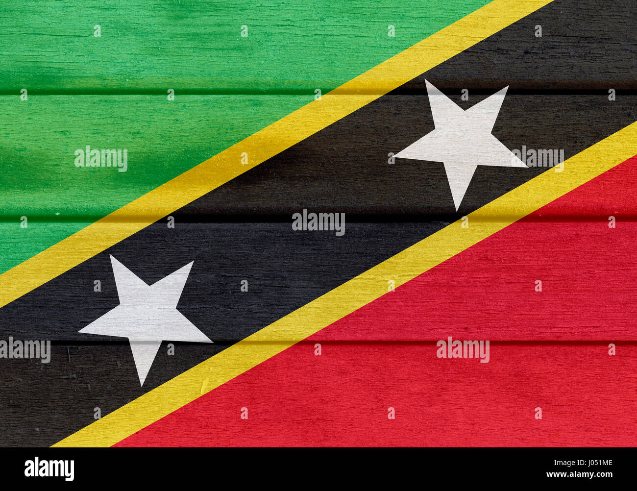 Abbildung von Saint Christopher und Nevis Flagge über eine hölzerne strukturierte Oberfläche Stockfoto
