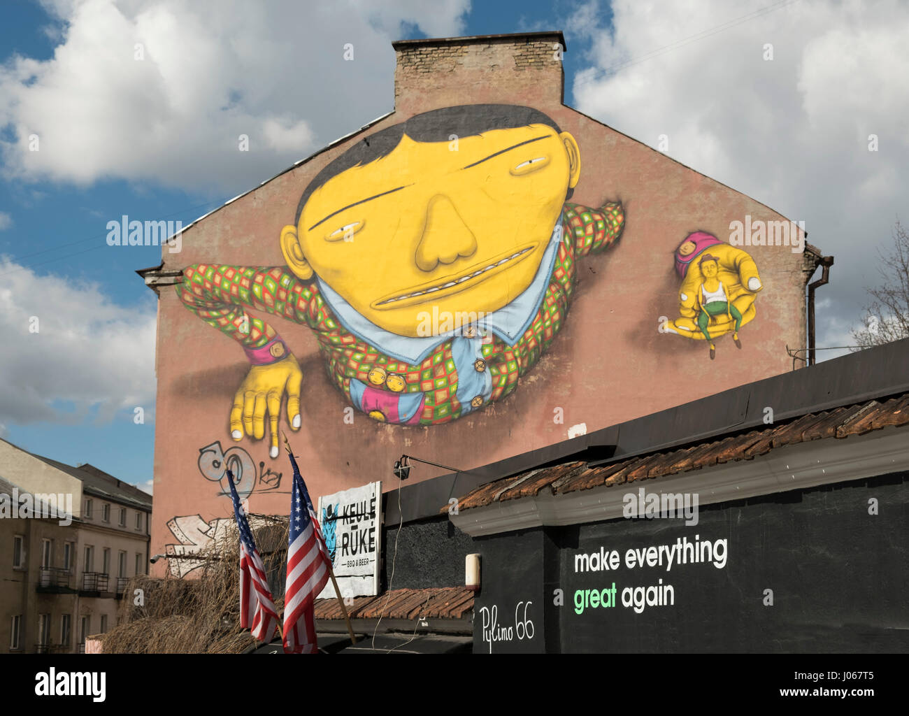 Wandbild von Os Gemeos (BR): Bewegung verhaftet Stockfoto