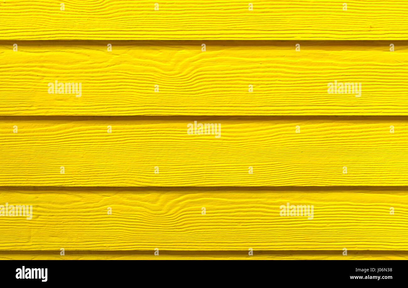 Gelbe Holzwand Hintergrundtextur Stockfoto