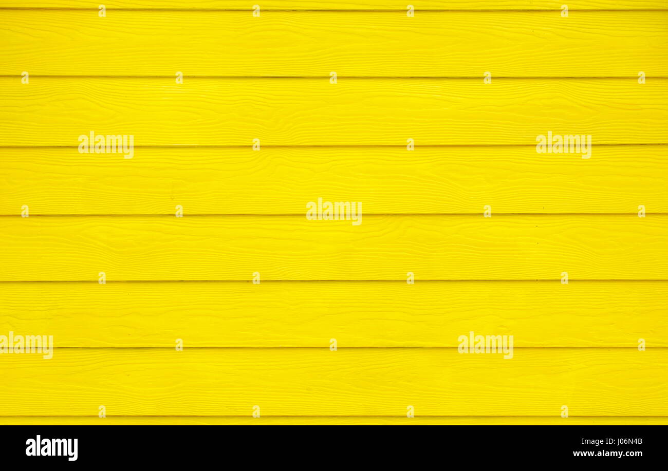 Gelbe Holzwand Hintergrundmuster Textur Stockfoto