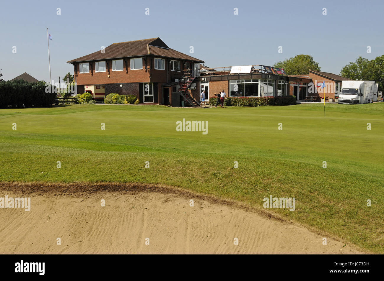 Blick auf das 18. Grün, Clubhaus, St Neots Golf Club, St Neots, Cambridgeshire, England Stockfoto
