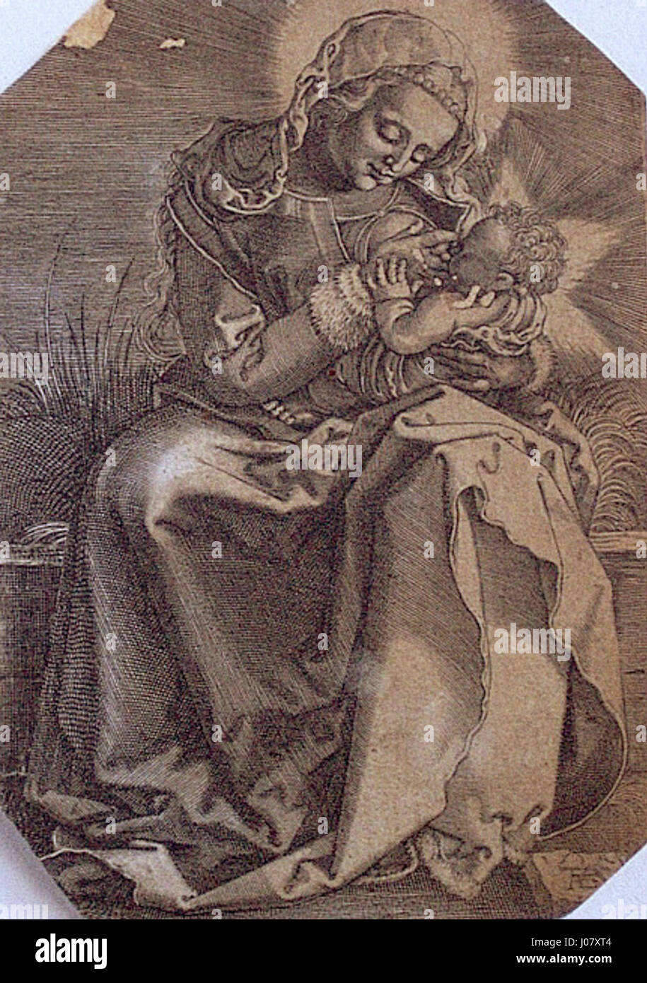 Dieses anonyme Werk im Stil von Albrecht Dürer zeigt die Jungfrau Maria, die das Kind Jesus stillt. Das Gemälde spiegelt den Einfluss der Renaissance auf die religiöse Ikonographie wider und betont die Zärtlichkeit und Heiligkeit der Szene. Stockfoto