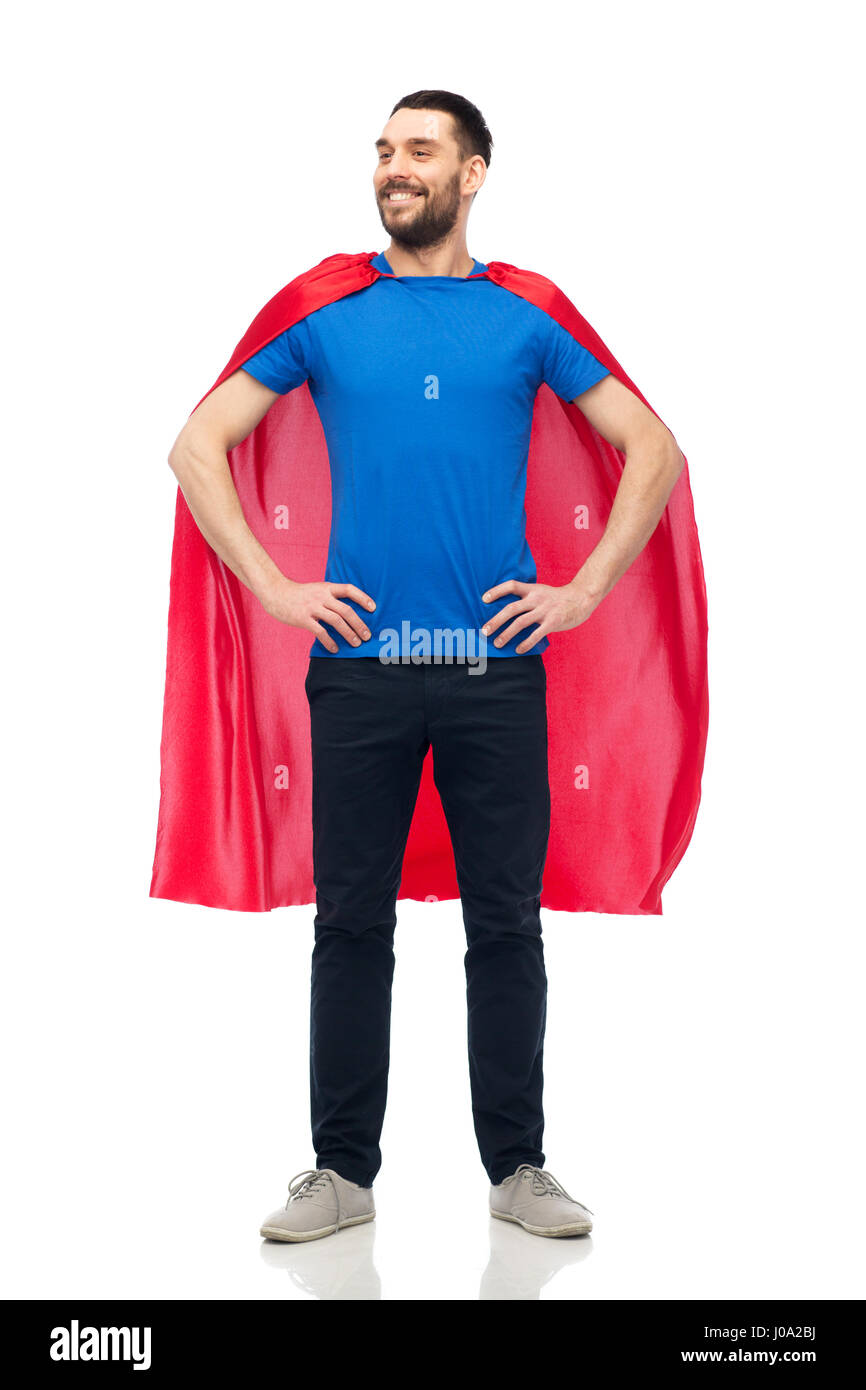 glücklicher Mann im roten Superhelden cape Stockfoto
