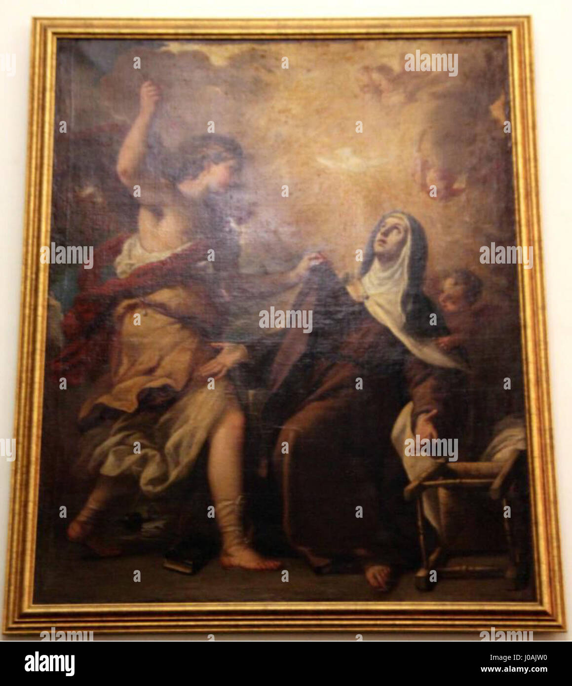 „Transverberación de Santa Teresa“ stellt die mystische Erfahrung der Heiligen Teresa von Ávila dar, einen Moment, in dem sie eine göttliche spirituelle Transformation erlebt hat. Das Kunstwerk betont die intensive religiöse Inbrunst und tiefe Spiritualität, die mit ihrer Vision verbunden ist. Stockfoto