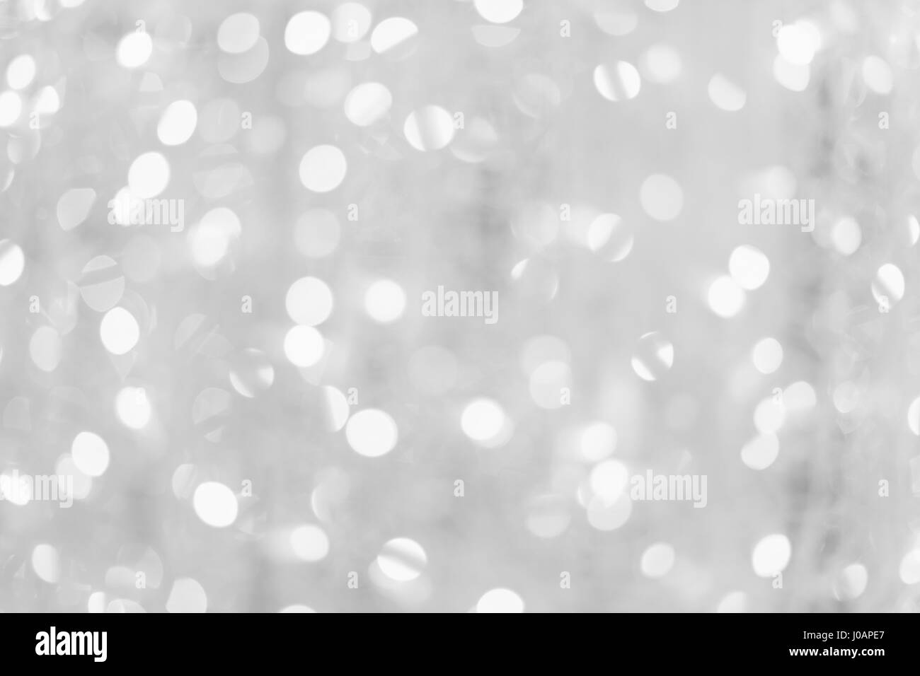 Weißer Hintergrund Bokeh von Weihnachten Leuchten für Design-Hintergrund Ihrer Werke. Stockfoto
