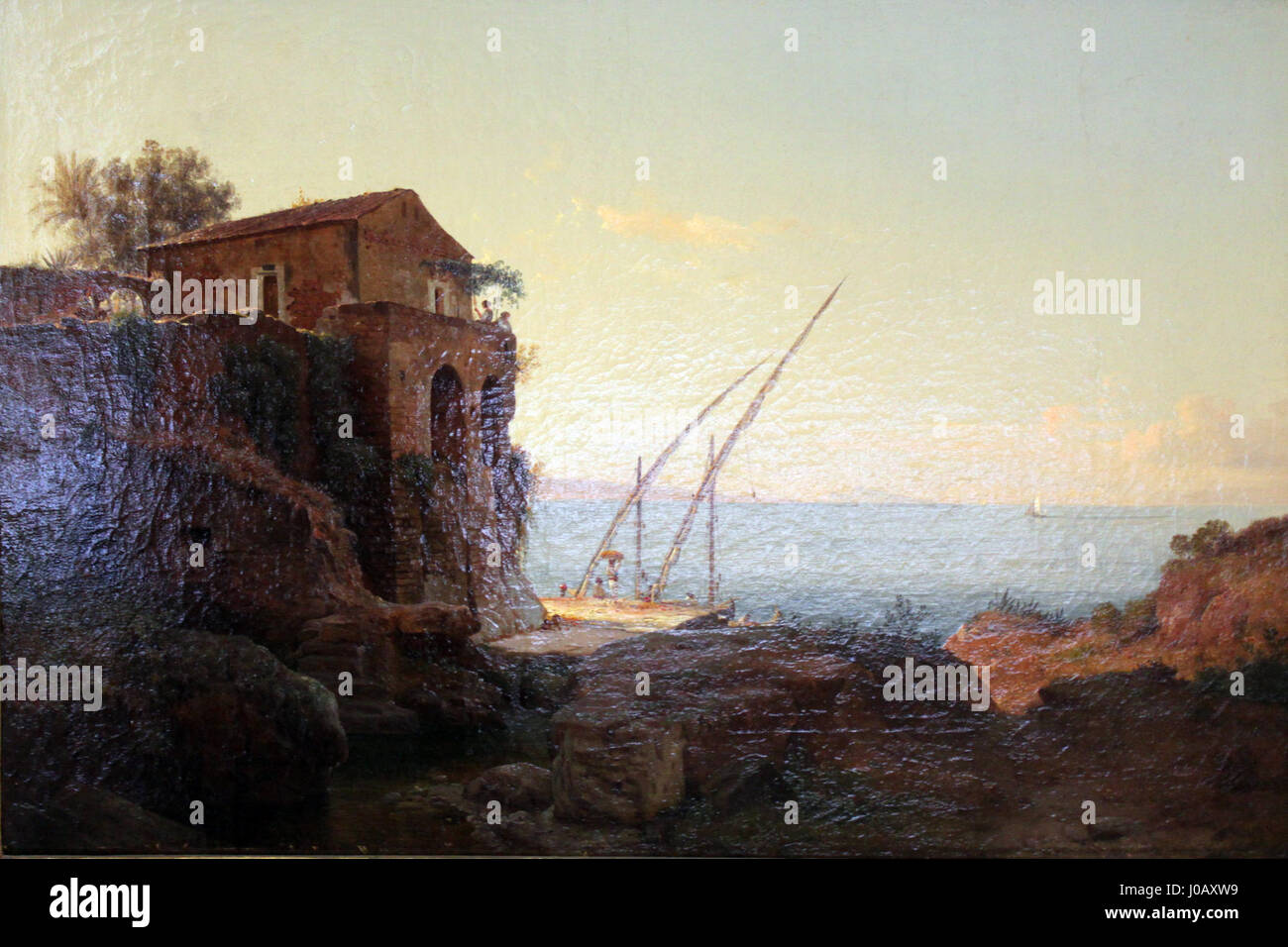 Das Gemälde „Italienische Küstenlandschaft“ von Gurlitt aus dem Jahr 1844 zeigt eine malerische Küstenlandschaft Italiens. Das Gemälde fängt die natürliche Schönheit der italienischen Küste ein und zeigt den sanften Hang der Hügel und das ruhige Wasser des Mittelmeers. Die detailreichen Pinselarbeiten und die sanften Farben des Künstlers unterstreichen die Gelassenheit der Landschaft. Stockfoto