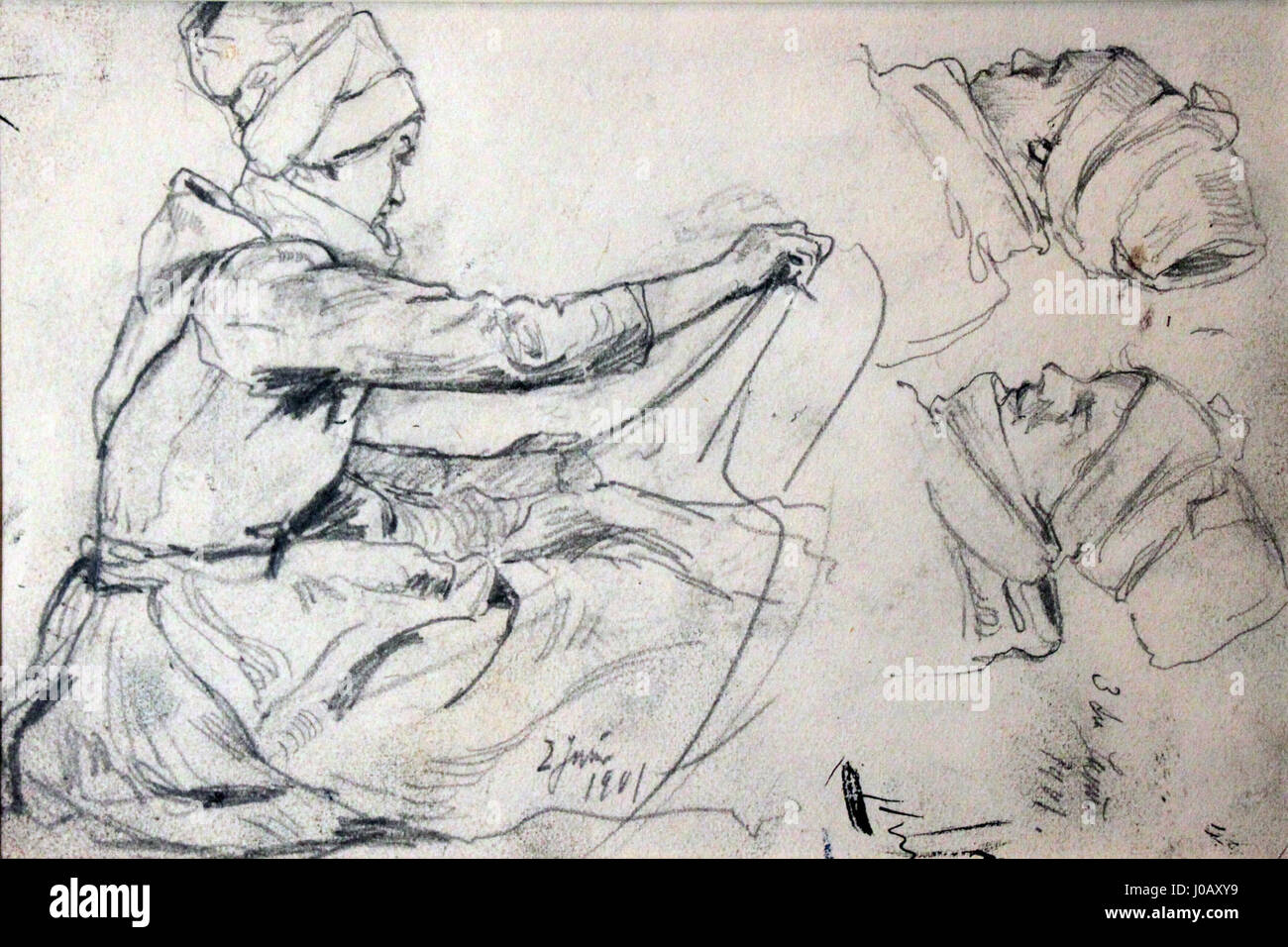 Die „Feddersen Netzflickerin auf Fan“ von 1901 ist ein Gemälde aus dem frühen 20. Jahrhundert, das die Szene eines Fischers zeigt, der seine Netze repariert. Das Kunstwerk spiegelt das mühsame und einfache Leben eines Fischers in den frühen 1900er Jahren wider Stockfoto