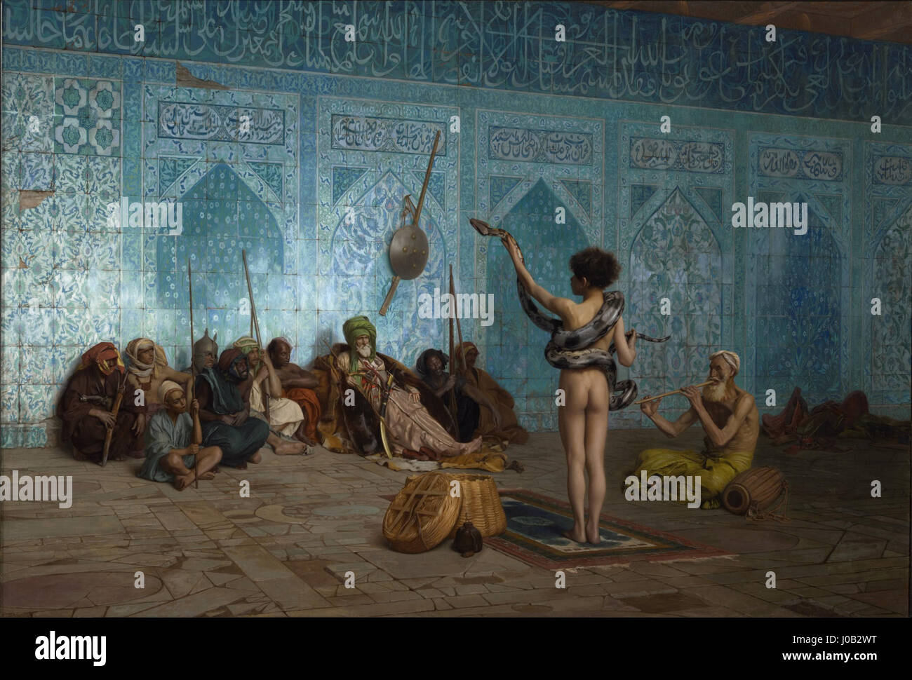 Jean-Léon Gérôme *Le charmeur de Serpents* (der Schlangenbeschwörer) stellt eine exotische Szene eines Schlangenbeschwörers dar, der mit einer Python auftritt, und unterstreicht Gérôme Fähigkeit, Objekte aus dem Nahen Osten einzufangen, und seinen detaillierten Realismus. Stockfoto