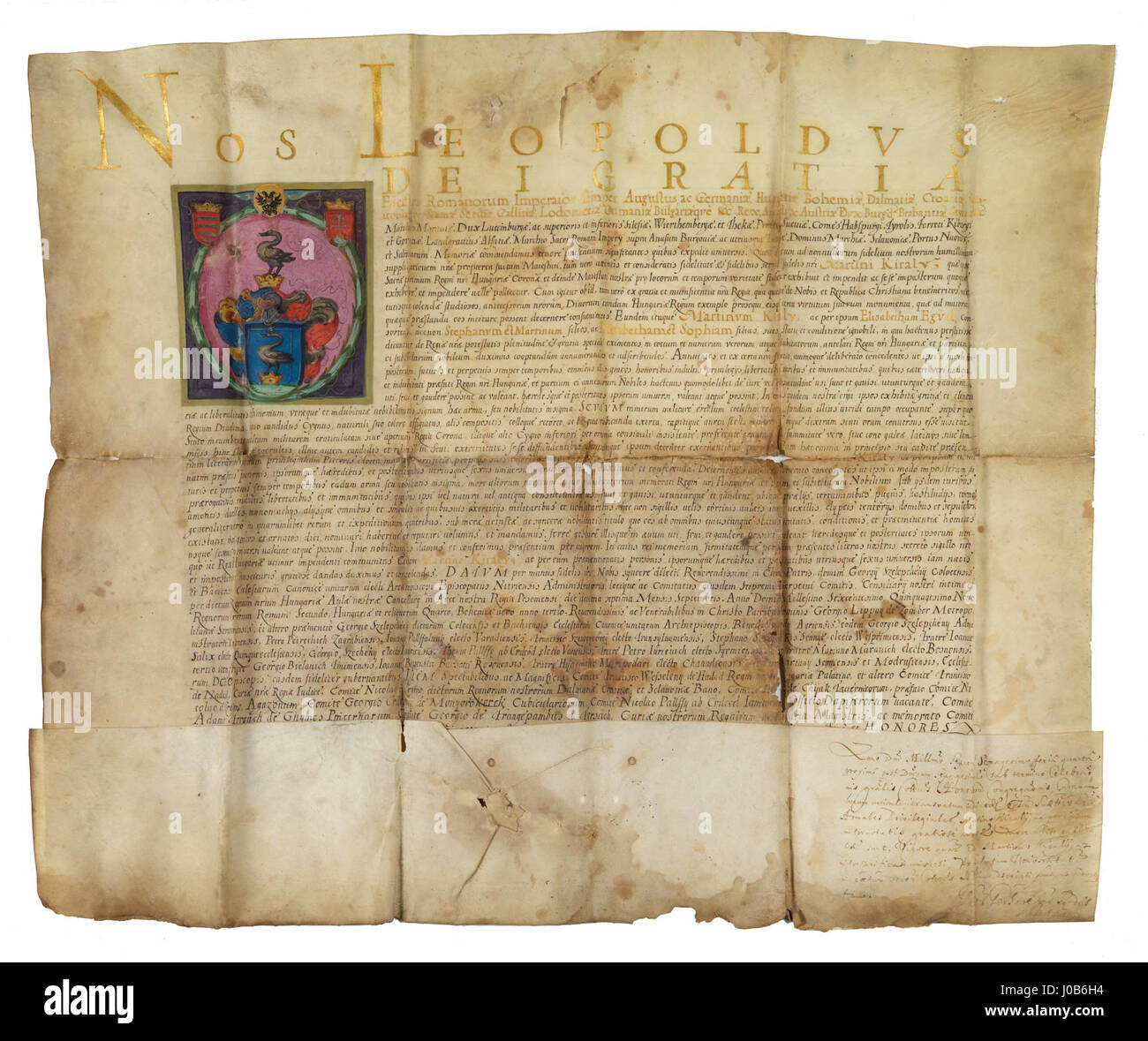 Dieses Dokument, ein Adelsdiplom, das Martin Kirly 1659 verliehen wurde, würdigt seinen edlen Status im europäischen Adelssystem. Es ist eine wichtige historische Aufzeichnung, die die Werte und sozialen Strukturen des Adels des 17. Jahrhunderts in Europa widerspiegelt. Stockfoto