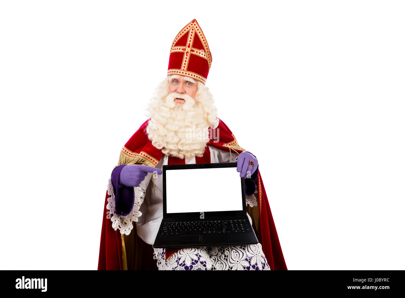 Sinterklaas mit Laptop. isoliert auf weißem Hintergrund. Niederländischen Charakter von Santa Claus Stockfoto