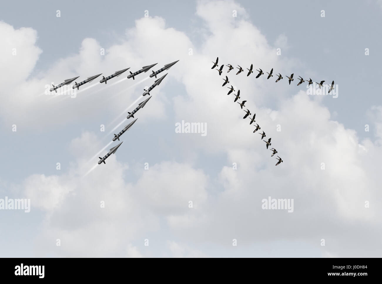 Krieg-Frieden-Konzept als eine Gruppe von friedlichen Gänse in einer V-Formation, die vor gefährlichen Raketen als Metapher für Gewalt gegen Pazifismus. Stockfoto