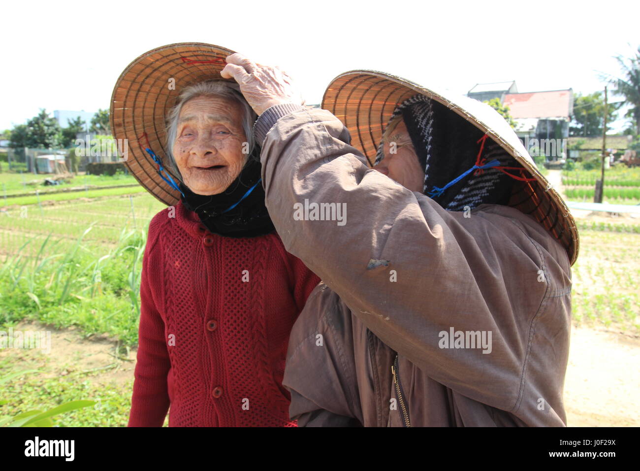 Eine glückliche alte paar auf einem Bauernhof, Hoi an, Vietnam Stockfoto