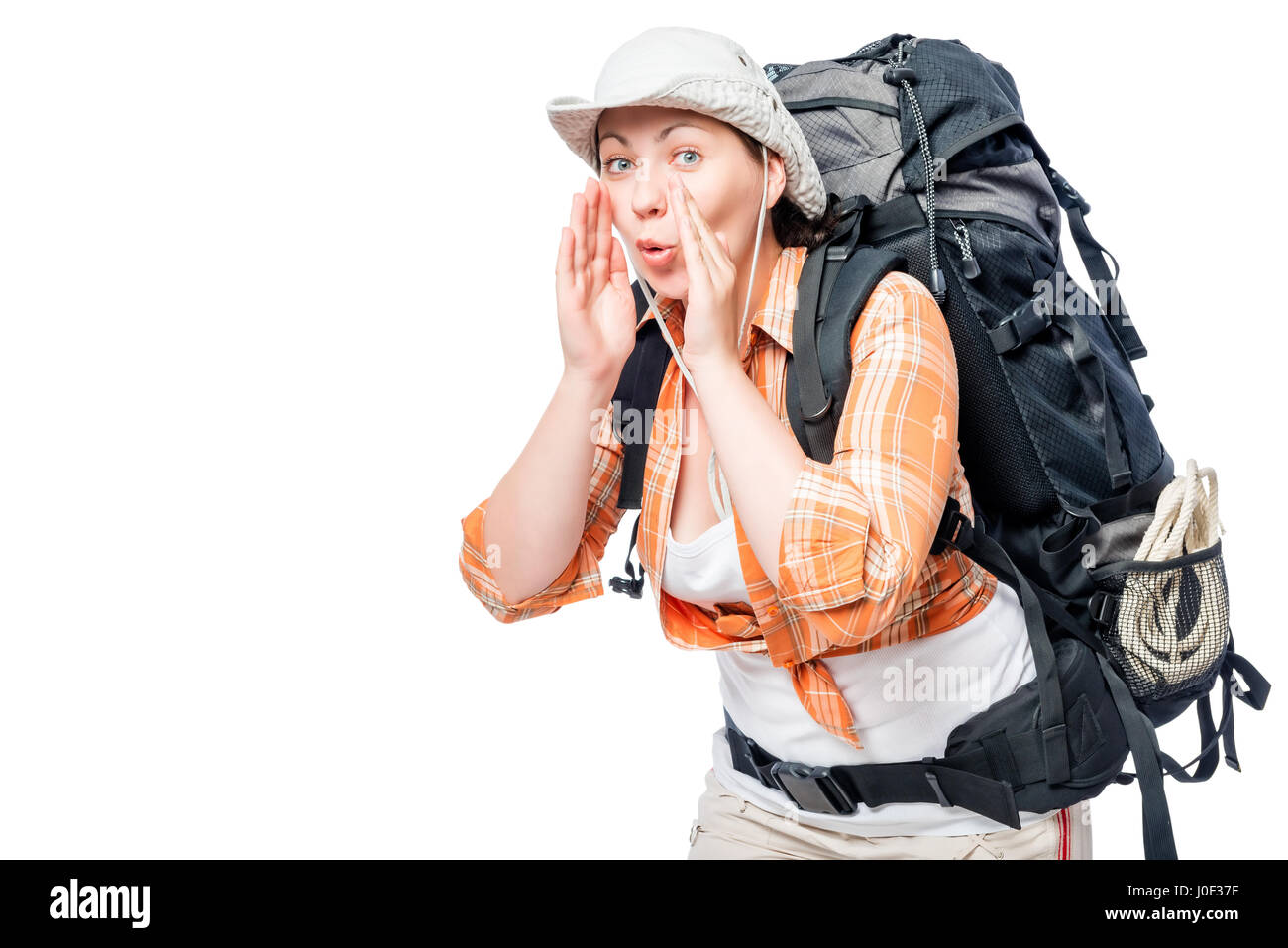 Tourist verirrt, sie macht eine Geste, um Hilfe auf weißem Hintergrund Stockfoto