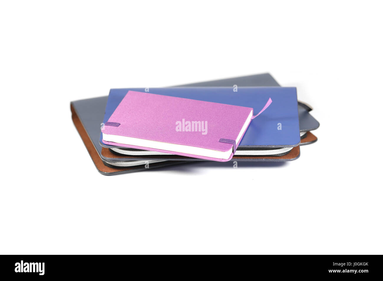 Notebooks, die isoliert auf weißem Hintergrund Stockfoto