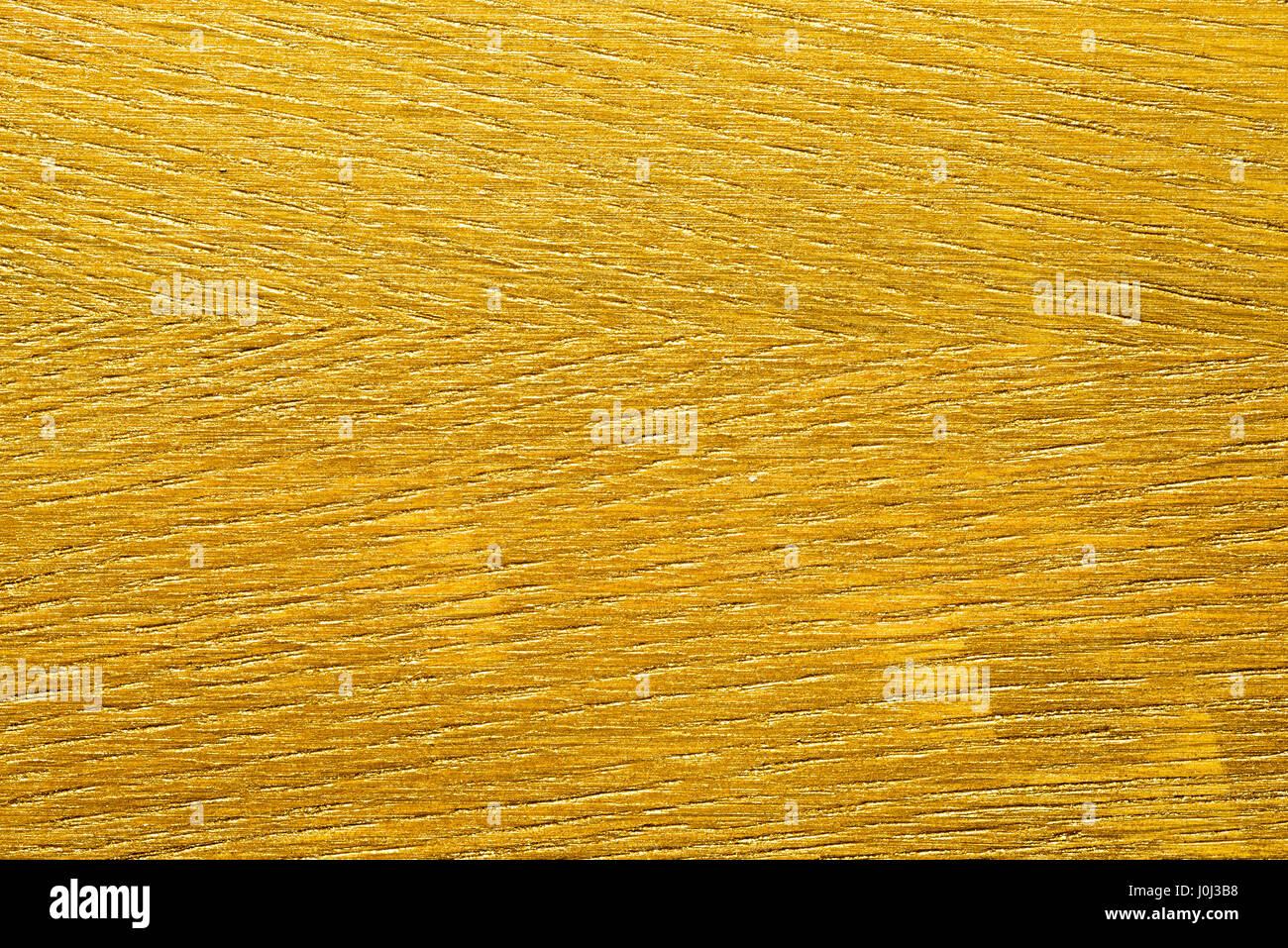 Golden gemalte abstrakte Hintergrundtextur Stockfoto