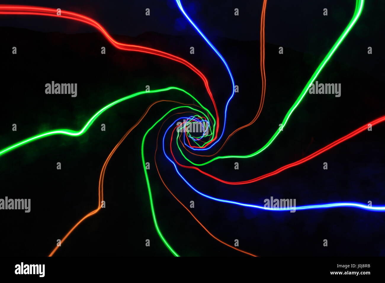 Mehrfarbige Licht Malerei Fotografie vor schwarzem Hintergrund Stockfoto