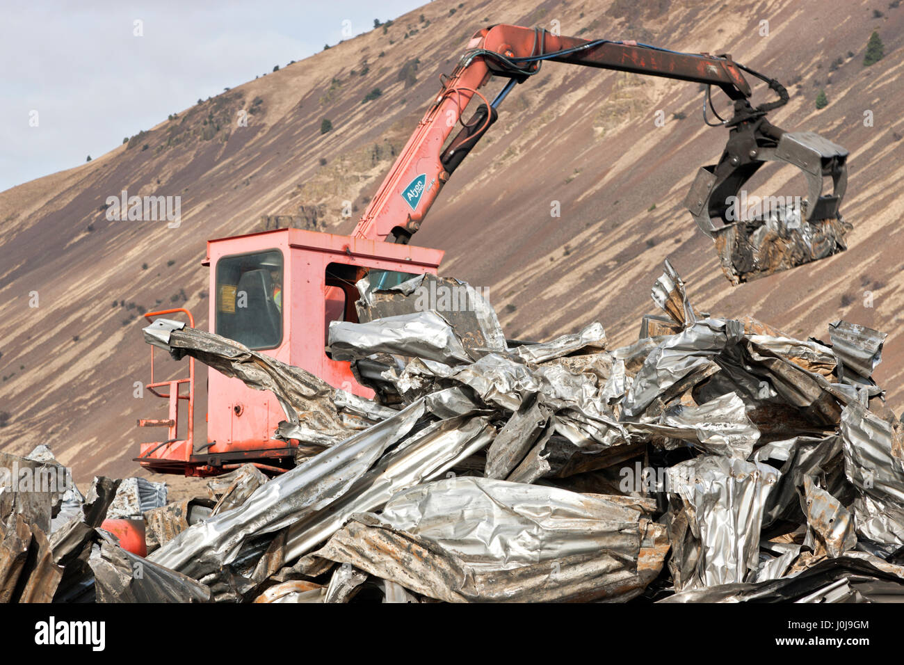 Al-Jon Traktor mit Schaukel Boom laden Aluminium-Folie. Stockfoto